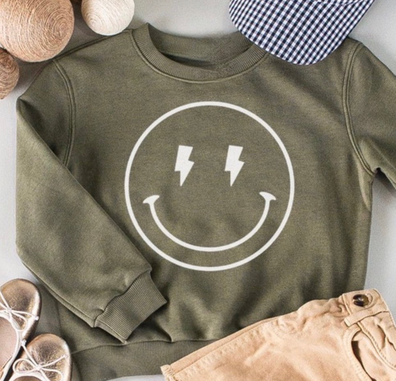 Olive lightning bolt smiley sweater