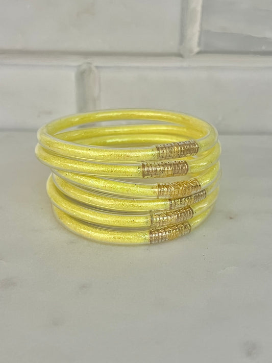 All weather neon yellow bangles