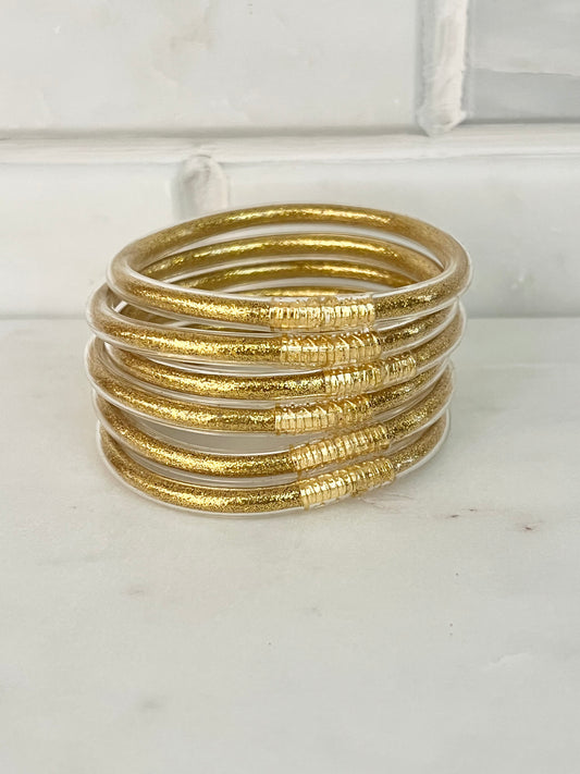 All weather gold bangles