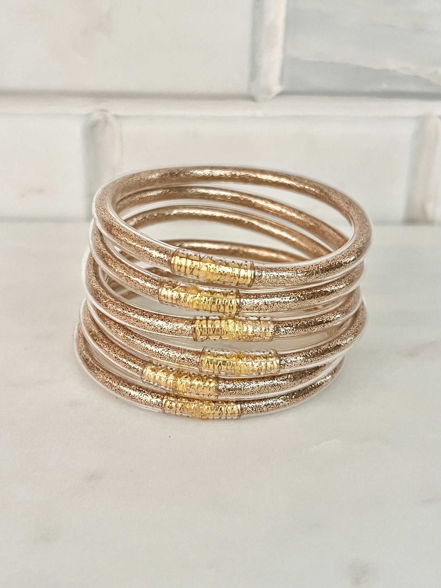 All weather rose gold bangles