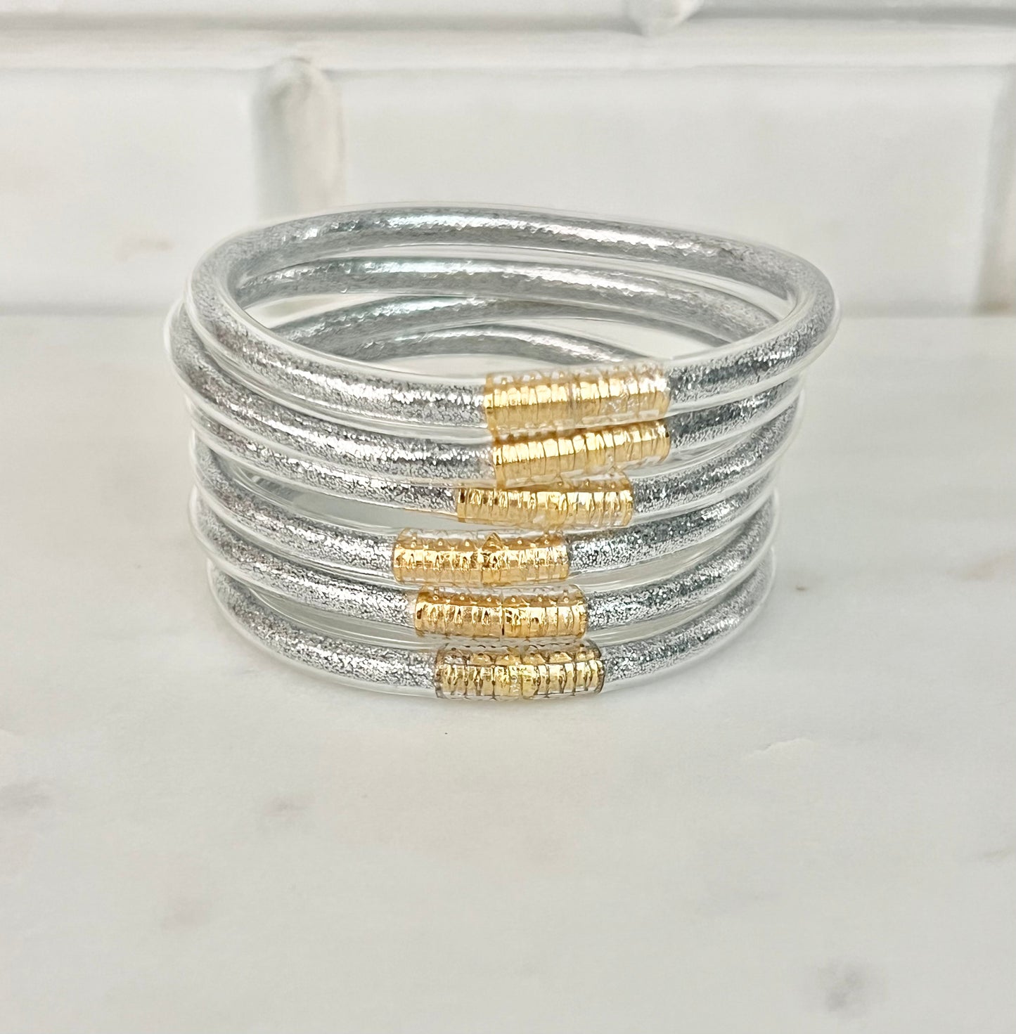 All weather silver bangles